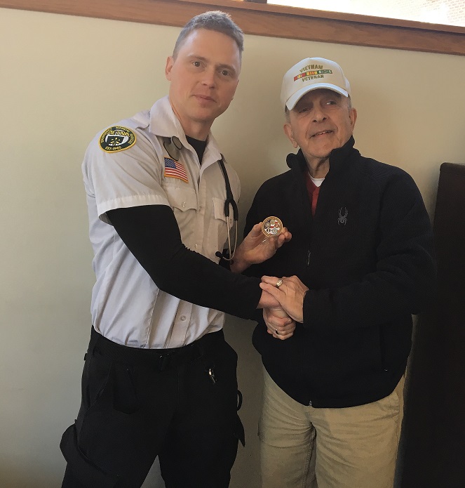 Aetna Paramedic Receives Challenge Coin